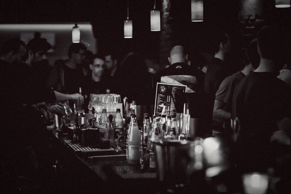 A busy bar at night