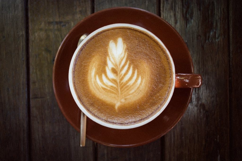Latte art on a wooden table